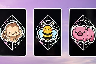 Three pick a card piles from the Mystic Mondays Tarot deck: pile 1 — monkey, pile 2 — bee, pile 3 — pig