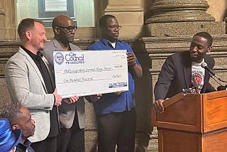 A $100,000 check presentation from City Council to Philly Legendary Summer Hoops Month