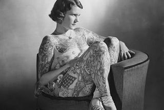 Betty Broadbent, the ‘Tattooed Venus’, Sydney, 1938. Regarded as the most photographed tattooed lady of the 20th century. photographer Ray Olsen, Pix Magazine, State Library of New South Wales. 4 April 1938. (Image source: Public Domain).