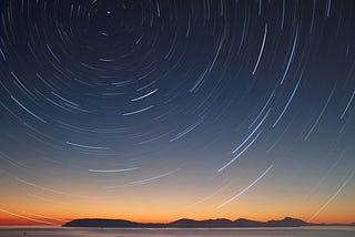 a long exposure of the night sky, centred on the north star