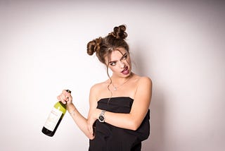 Female with a bottle of wine