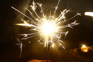 A picture of a New Year’s sparkler ignited.