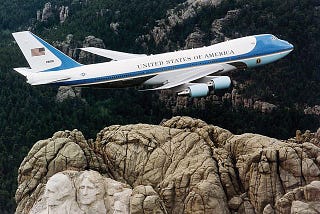 Air Force One flying over Mount Rushmore