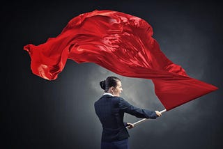 Woman waving red flag