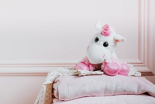 A stuffed animal unicorn