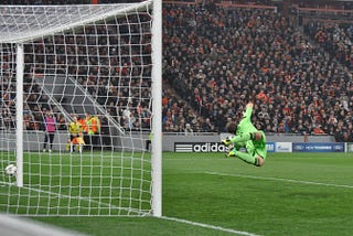 A goalkeeper missing a save during a Champions’ League game between Shakhtar Donetsk and Bayern Leverkusen in 2013.