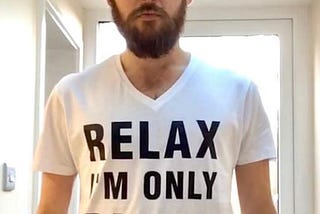 Alex Innes wearing a T shirt that reads Relax I’m Only Blind for charity Support4Sight