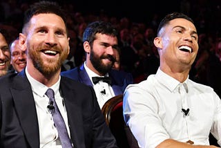 Messi and Ronaldo during UEFA event in Monaco.