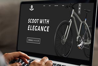 laptop showing the landing page of website