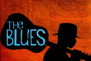 A Blues Musician from https://bkhonline.com/the-birth-of-the-blues/