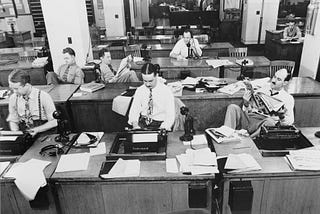 Black and white image of vintage newsroom