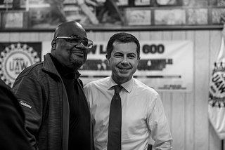 Secretary Buttigieg with a member of UAW Local 600