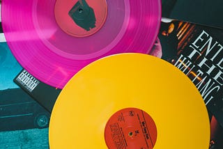 Purple vinyl record on a table.