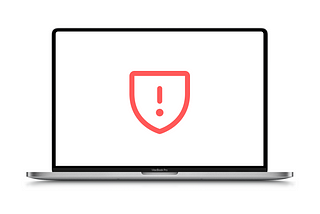 macbook screen with a warning security sign