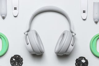 Varying headphone pieces in a scattered array.