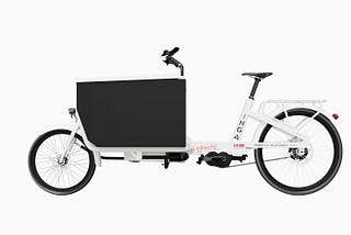 A side-profile view of the Inga Solar Cargo bike on full display