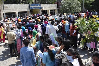 Students waiting in que under scorching heat of sun to attend interviews