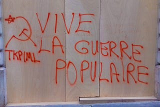 The graffiti slogans on the walls of Paris highlight the Gilets Jaunes’ ideological diversity: A…