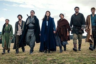 Zoë Robbins as Nynaeve, Barney Harris as Mat, Daniel Henney as Lan, Rosamund Pike as Moiraine, Madeleine Madden as Egwene, Marcus Rutherford as Perrin, and Josha Stradowski as Rand