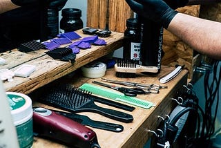 assortment of combs and brushes