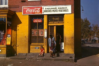 Schulman’s Market Washington DC. A woman and a little girl standing in front