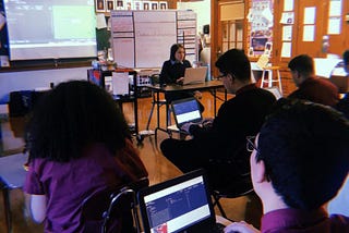 Teaching an hour of code to high school students during their lunch hour