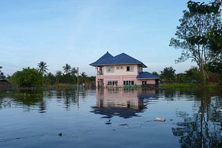 A Breakup and a Flood: Surviving the Tropical Storm That Killed 815 People In Asia