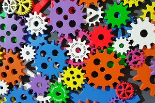 an images of many brightly colored gears.