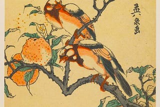 A Japanese color wood block print depicting two birds in a tree with pomegranates.