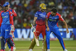 Delhi Capitals’ Ishant Sharma celebrates the wicket of Royal Challengers Bengaluru’s Virat Kohli during an Indian Premier League (IPL) 2024 T20 cricket match between Royal Challengers Bengaluru and Delhi Capitals, at the M Chinnaswamy Stadium, in Bengaluru.