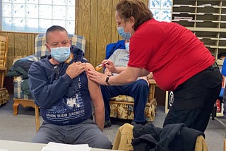 Slow vaccine rollout will move on to at-risk groups next week