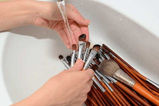 How often should makeup brushes be cleaned