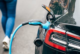 An electric vehicle being charged.