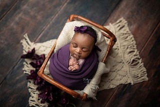 What age do you do a newborn photoshoot?