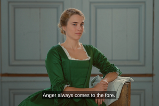 Heloise poses for Marianne in her green dress. Marianne comments on her expression: “Anger always comes to the fore”.