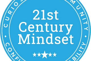 A blue circle with white writing. 21st Century Mindset in the centre and curiosity — community — confidence — capability around the outside
