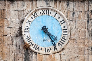 Ancient Clock Tower by evannovostro, via Adobe Stock.