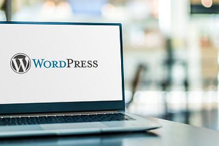 Laptop with “WordPress” logo on screen. Agency Name/Contributor Name — stock.adobe.com