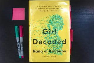“Girl Decoded” book by Rana el Kaliouby on a desk with pens and sticky notes