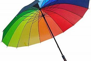 Umbrella with the coulours of the raibow; white background.