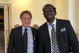 Legally blind inventor Zuby Onwuta, meets Ray Kurzweil at #NFB18