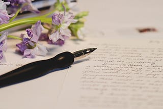 A visual represntation of a pen and a letter for readers of this publication