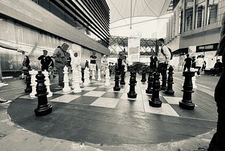 At a game of giant chess