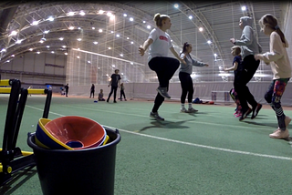 Young Athletes warming up on a Track