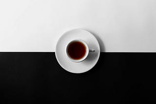 Image of cup of tea on black and white background. Photo by Mukul Wadhwa on Unsplash