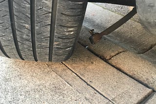 Picture of tire with broken steering rod