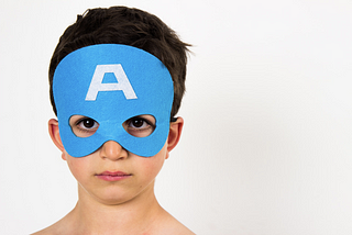 Child wearing the Captain America Mask