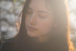 A close up beautiful woman outdoors.