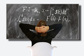 Person looking at blackboard with calculus equations