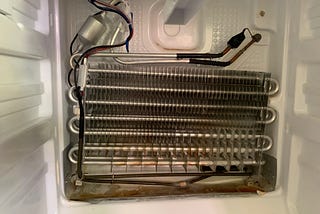 Frozen drainage of self defrosting freezer